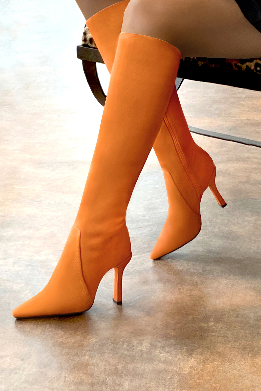 French elegance and refinement for these apricot orange feminine knee-high boots, 
                available in many subtle leather and colour combinations. Record your foot and leg measurements.
We will adjust this pretty boot with zip to your measurements in height and width.
You can customise your boots with your own materials, colours and heels on the 'My Favourites' page.
To style your boots, accessories are available from the boots page.
For fans of the pointy model, and the tapered leg. 
                Made to measure. Especially suited to thin or thick calves.
                Matching clutches for parties, ceremonies and weddings.   
                You can customize these knee-high boots to perfectly match your tastes or needs, and have a unique model.  
                Choice of leathers, colours, knots and heels. 
                Wide range of materials and shades carefully chosen.  
                Rich collection of flat, low, mid and high heels.  
                Small and large shoe sizes - Florence KOOIJMAN
